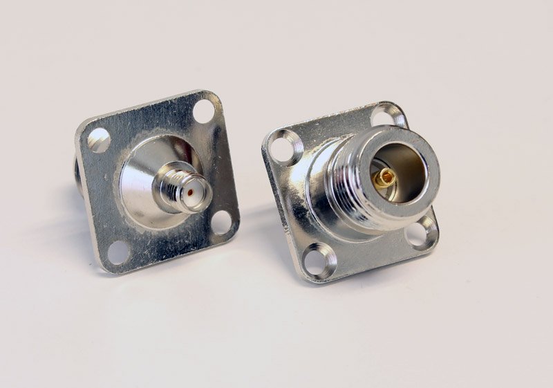 Adapter SMA female to N female for panel mounting